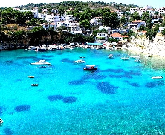 Alonnisos is a Greek island in the Aegean Sea member of the Northern Sporades. In this photo are shown the stunning blue waters from Votsi Harbour. The island and the...