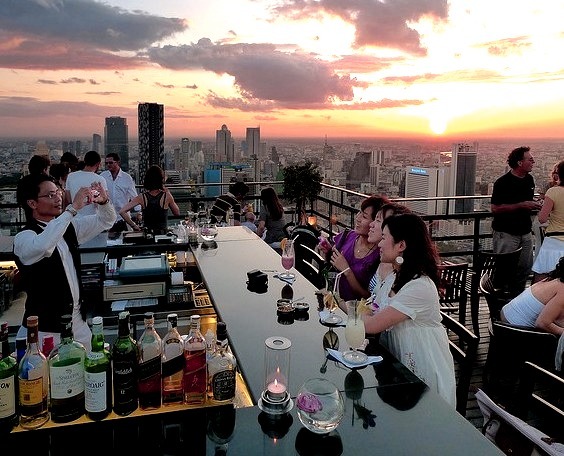 Enjoying a drink on the top of Banyan Tree Hotel, Bangkok, Thailand