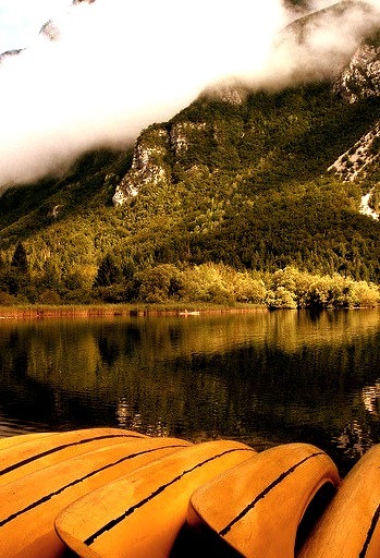 Yellow canoes on the shores of Lake Bohinj, Slovenia